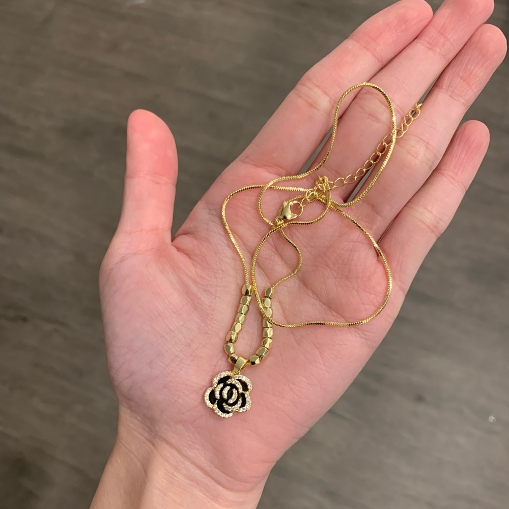 Gold and Black Rose Pendant Necklace